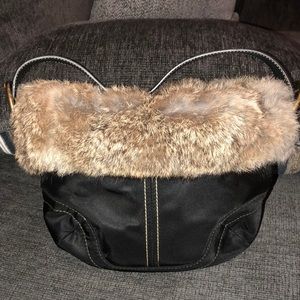 Fur coach bag with leather strap